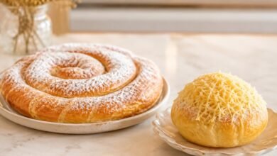 Fresh Mallorcan ensaimada and Filipino cheese ensaymada in a warm bakery