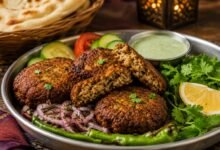 Shami kebab near Long Island City and Queens served with chutney, onion, lemon and naan