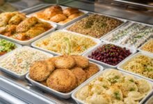 Eastern European deli counter with kotleti, stuffed cabbage, salads, dumplings and prepared side dishes