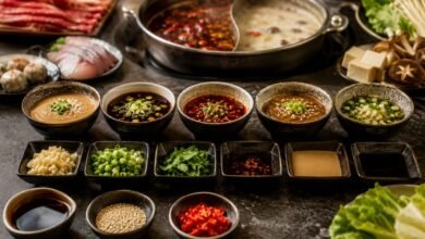 Five hot pot dipping sauce combinations with sesame, shacha, soy-vinegar, chile oil, garlic, scallions, and cilantro