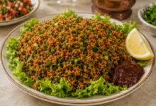 Kisir bulgur salad with parsley, green onion, lettuce and lemon
