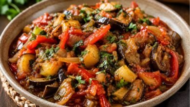 Traditional Georgian ajapsandali with eggplant, tomatoes, peppers, onions and fresh herbs