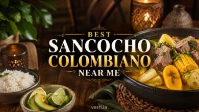 Colombian sancocho with beef, yuca, corn and plantain served with rice and avocado