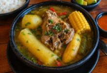 Colombian sancocho with meat, yuca, plantain, corn and potatoes representing different traditional sancocho styles