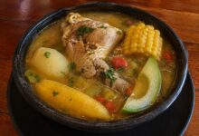 Sancocho in Wichita with chicken, plantain, corn, avocado and vegetables in a hearty broth