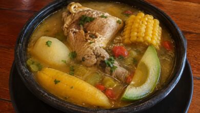 Sancocho in Wichita with chicken, plantain, corn, avocado and vegetables in a hearty broth