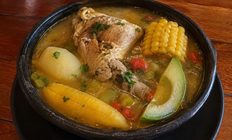 Sancocho in Wichita with chicken, plantain, corn, avocado and vegetables in a hearty broth