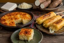 Traditional Bolivian sonso de yuca served baked and grilled on wooden sticks